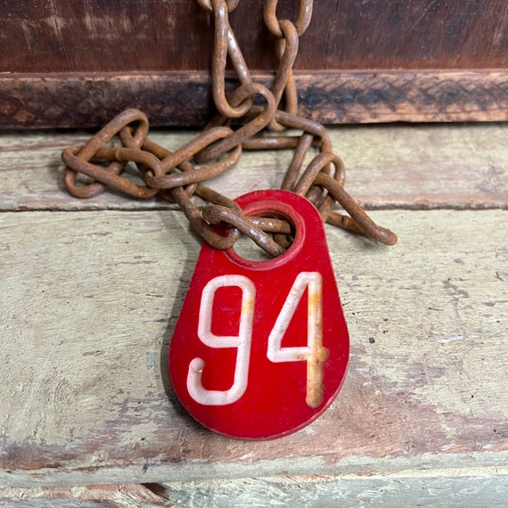Vintage plastic cow tag on a chain – number 94  -antique plastic livestock ID tag – plastic bull tag – cattle tag – industrial number -