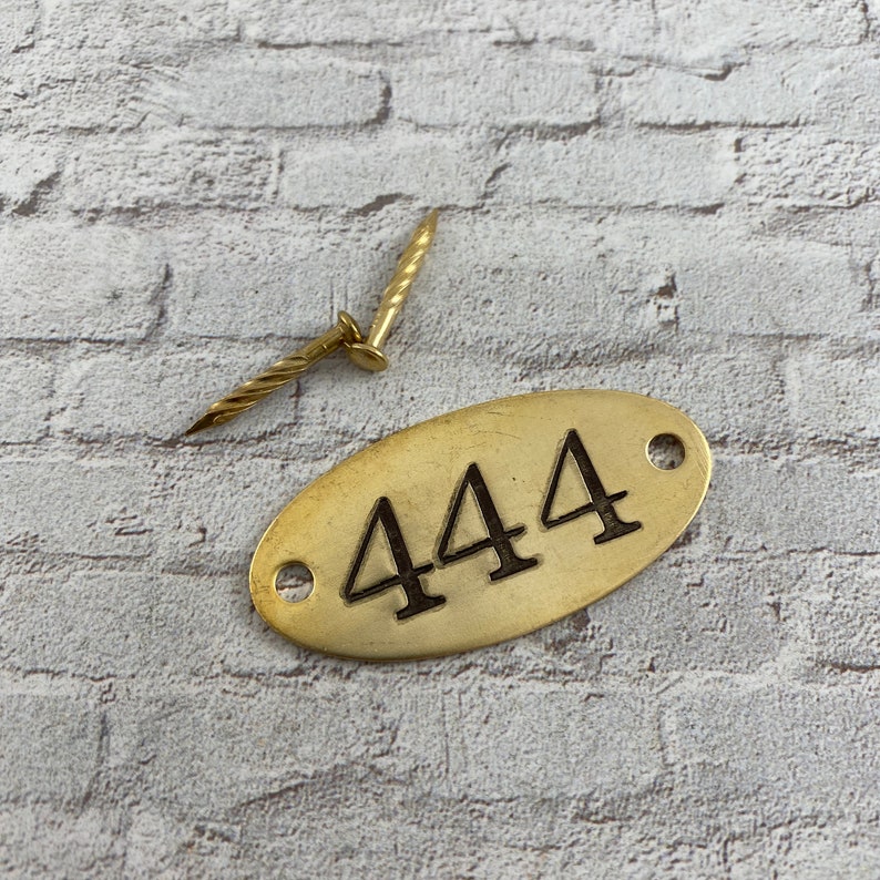 Hand punched brass or aluminum numbered tags Custom numbered locker tags oval year date number plates hotel room door numbers Brass with nails