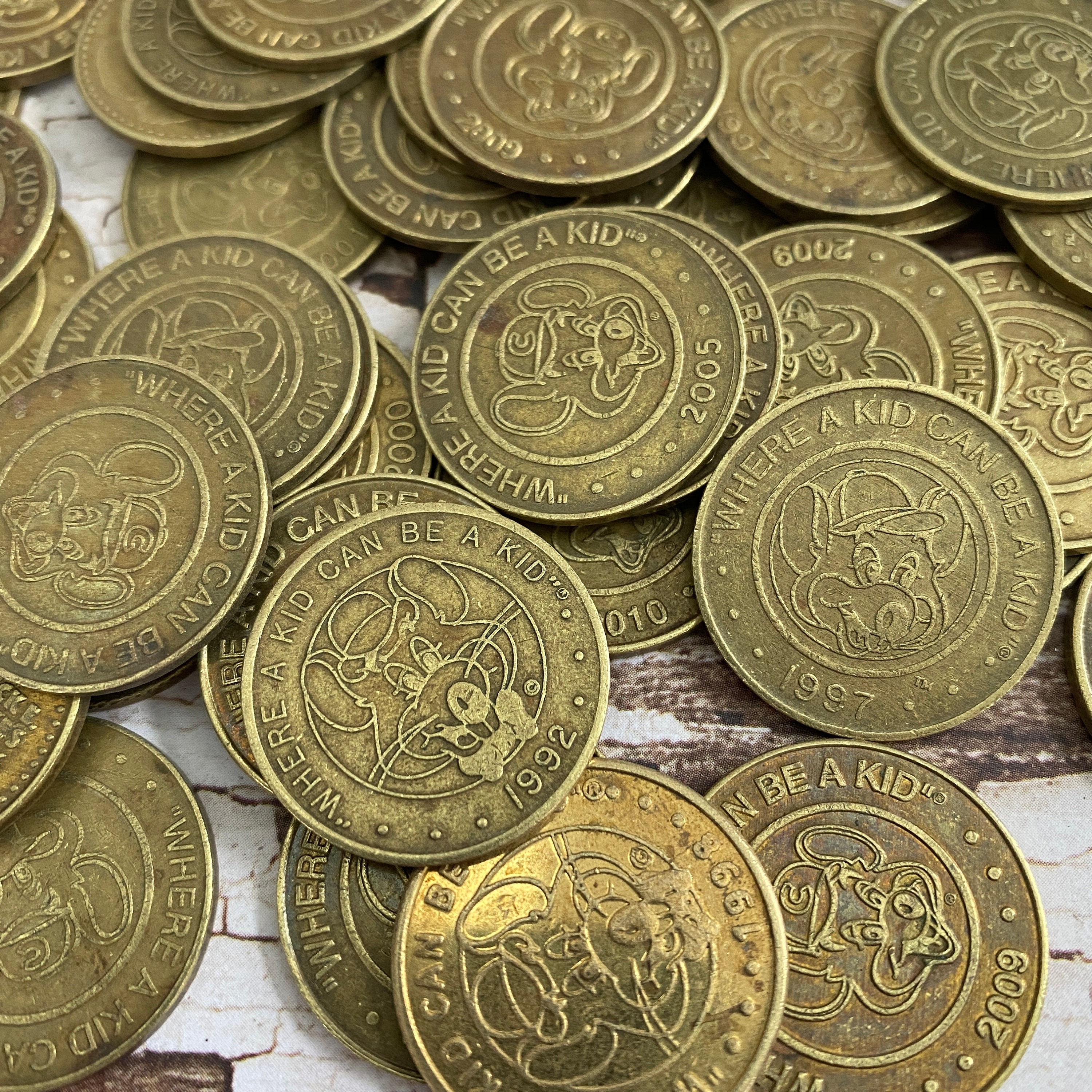 Chuck E Cheese's Arcade Set of Tokens vintage Tokens Old Coin