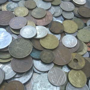 May include: A collection of vintage coins in various denominations and metals, including copper, silver, and gold. The coins are arranged in a random pattern, with some overlapping. The coins are in good condition, with some showing signs of wear and tear.