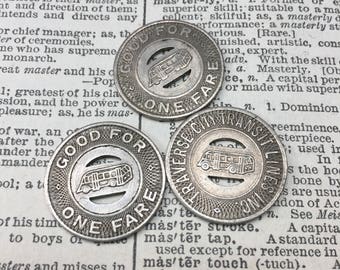 Set of 3 Tokens -vintage Traverse City transit tokens - bus fare token - subway token - michigan token - vintage token