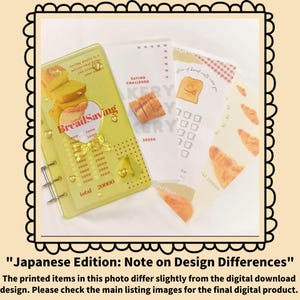 May include: A yellow BreadSaving binder with a gold bow and heart accents, alongside printed saving challenge sheets. The binder has a total savings goal of 20,000. The image includes text: "Japanese Edition: Note on Design Differences."