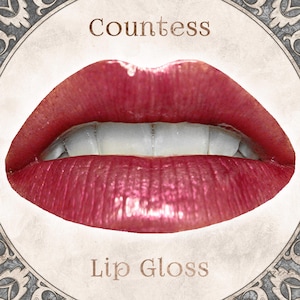 COUNTESS Lip Gloss: Shimmery Dark Ruby Red with Glitter,