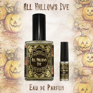 May include: A clear glass perfume bottle and a smaller sample vial, both labelled Fabled Fragrances All Hallows Eve Eau de Parfum. The larger bottle is 30 ml and the smaller vial is 3 ml, featuring black caps and gold text on a decorative label.