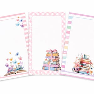 May include: Three rectangular stationery sheets with white centers and decorative borders. The first has pink stripes and butterflies emerging from an open book. The second has a pink gingham border and a stack of books tied with a bow. The third has pastel stripes and a stack of books with flowers and a teacup.