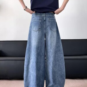 Wide Leg Jeans | Washed Loose Denim Pants | Daily Wear | Retro Streetwear Style

Washed wide leg denim jeans with oversized loose fit and retro casual streetwear style.