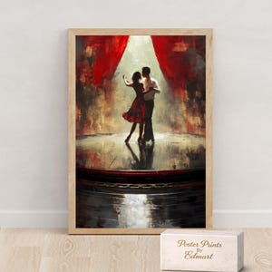 May include: A framed art print depicts a couple dancing on a stage, illuminated by a spotlight. The dancers are in silhouette, with the woman in a red dress. Red curtains frame the stage. The print is in a wooden frame.