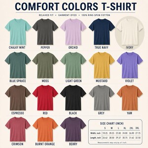 May include: A display of Comfort Colors T-shirts in various colors, including Chalky Mint, Pepper, Orchid, and True Navy. The image also includes a size chart in inches, with measurements for width and length ranging from S to 3XL. The shirts are relaxed fit, garment-dyed, and made of 100% ring-spun cotton.