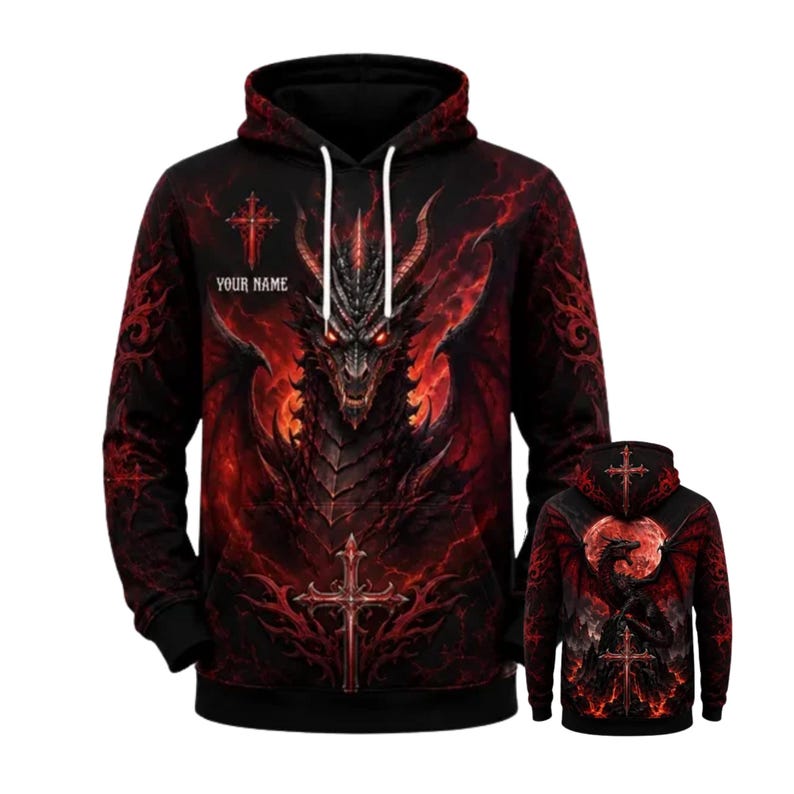 May include: A black hooded sweatshirt featuring a large, detailed graphic of a dragon with glowing red eyes and wings. The design includes red lightning patterns, two ornate crosses, and the text YOUR NAME printed on the front chest area.