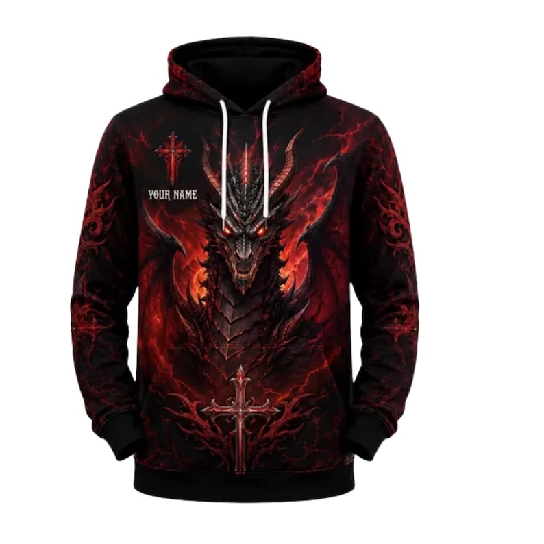 May include: A black hoodie featuring a large, detailed graphic of a red-eyed dragon with wings spread. The design includes red lightning patterns, two ornate red crosses, and the text "YOUR NAME" printed on the upper left chest area.
