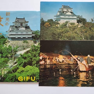 May include: A collection of three printed items featuring Gifu Castle in Japan. One item shows the castle with Japanese text and the word GIFU, another shows the castle on a hill, and the third depicts a night scene of traditional cormorant fishing.