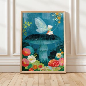 May include: A framed art print featuring a small fairy with translucent wings sitting atop a large, dark blue mushroom. The fairy holds a wand emitting yellow stars. The scene includes colourful flowers, a red spotted mushroom, and blue foliage.