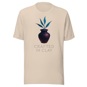 Elegant Minimalist Clay Pot Typography T-Shirt with Subtle Blue Leaf Accent, Premium Artistic Line Art Tee
