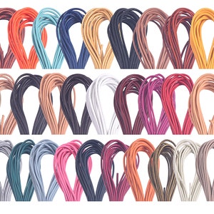 May include: A set of 30 colorful shoelaces, each in a different color, arranged in three rows of ten. The shoelaces are made of a smooth, round material and are approximately 100 cm long.