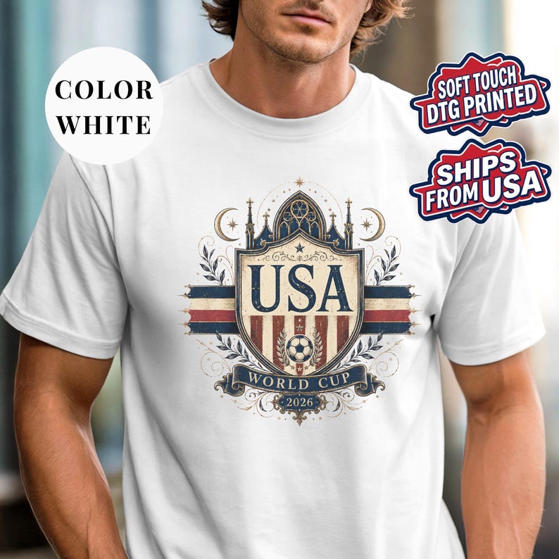 A man wearing a white t-shirt with a graphic design featuring the text "USA World Cup 2026".