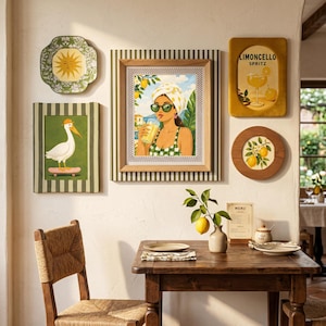 May include: A collection of wall art and decor featuring a sunny, summery theme. Includes framed prints, a decorative plate, and a small round picture. The artwork depicts a woman drinking a beverage, a bird on a skateboard, and lemons.
