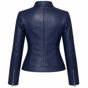 Back view of women’s navy blue leather jacket featuring a clean, slim fit design and premium stitching. Crafted from genuine lambskin leather with a soft silk lining for comfort. This navy biker jacket is ideal for fall and everyday use, offering a chic, modern look for women who want a stylish and durable leather jacket.