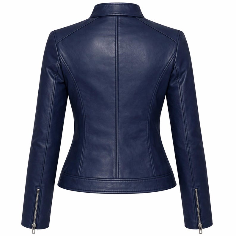 Back view of women’s navy blue leather jacket featuring a clean, slim fit design and premium stitching. Crafted from genuine lambskin leather with a soft silk lining for comfort. This navy biker jacket is ideal for fall and everyday use, offering a chic, modern look for women who want a stylish and durable leather jacket.