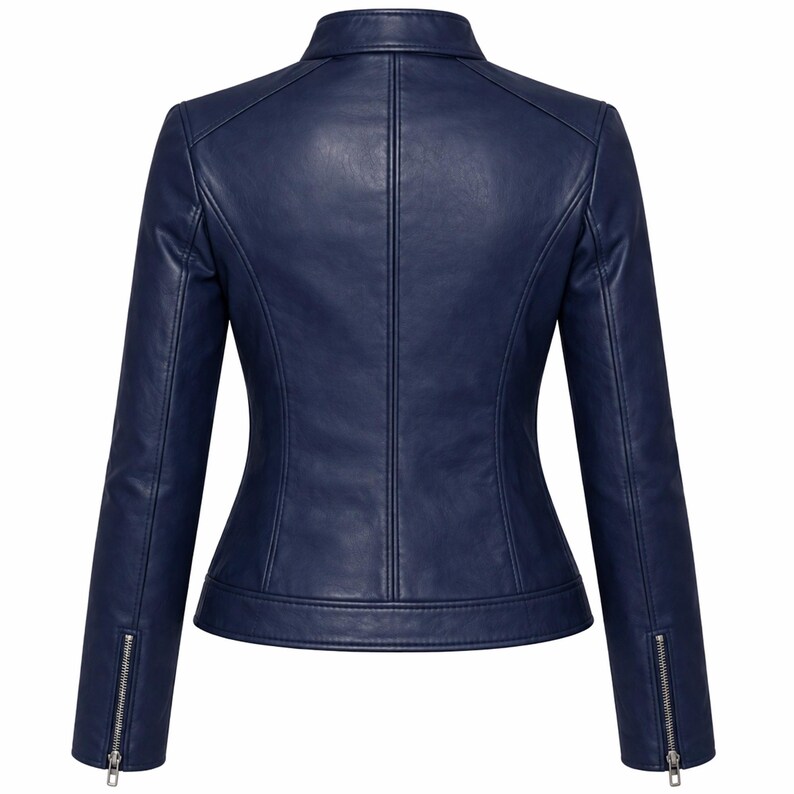 Back view of women’s navy blue leather jacket featuring a clean, slim fit design and premium stitching. Crafted from genuine lambskin leather with a soft silk lining for comfort. This navy biker jacket is ideal for fall and everyday use, offering a chic, modern look for women who want a stylish and durable leather jacket.