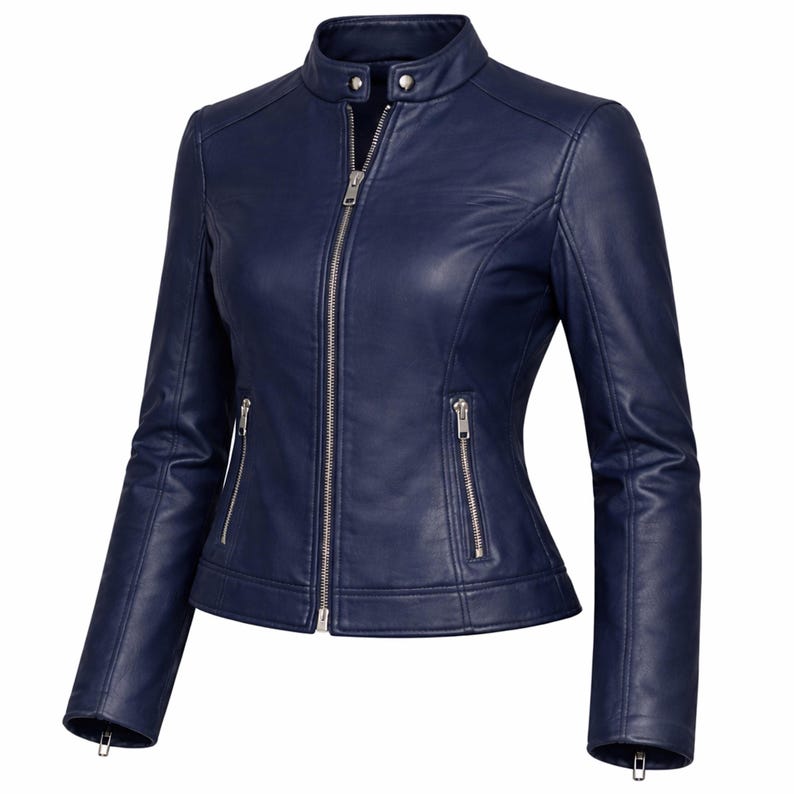 Stylish women’s navy blue biker leather jacket shown in an angled view, highlighting the slim fit and moto style design. Made from genuine lambskin leather with a smooth finish and silk lining. A perfect fitted leather jacket for casual fall outfits, combining comfort, durability, and modern fashion for everyday wear.