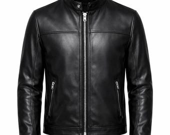 May include: A black leather jacket with a stand-up collar and a full-length zipper. The jacket has two zippered pockets on the front and a button closure at the collar. The leather appears smooth and the jacket has a classic, tailored design.