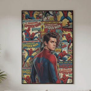 May include: A framed poster featuring a portrait of Spider-Man in his costume, set against a backdrop of vintage comic book covers. The poster has a black frame and is displayed above a white sofa with neutral-coloured cushions.