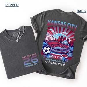 A pepper back print shirt the front features a minimal "SOCCER CUP 26 KANSAS CITY" logo.