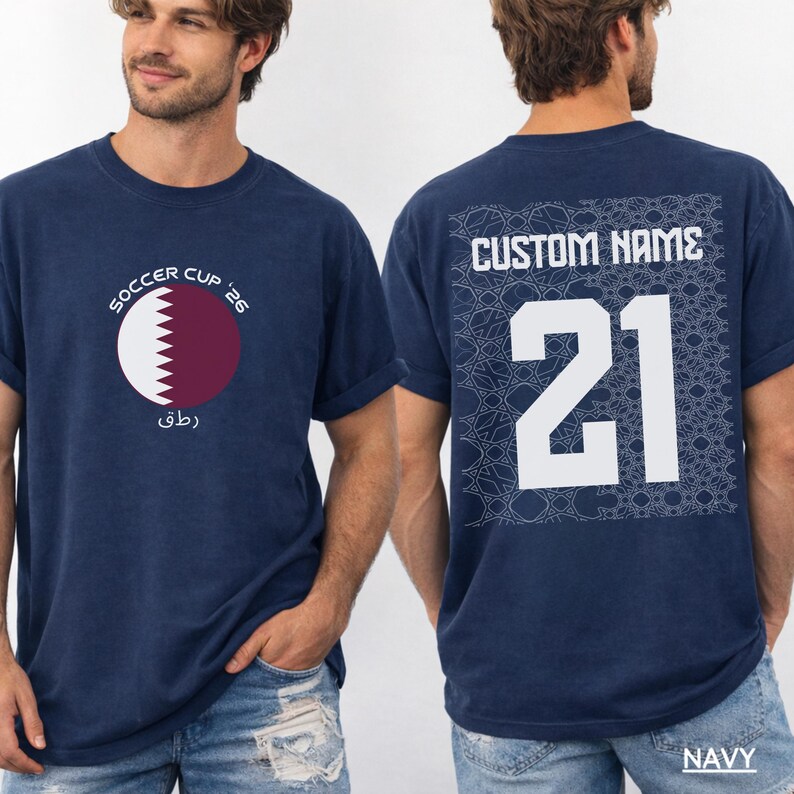 Two athletic men in a sports wearing custom NAVY oversized t-shirts showcasing the front Qatar emblem and the back personalized jersey number 21 design.