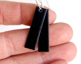 Black glossy dangle earrings made with hot enamel