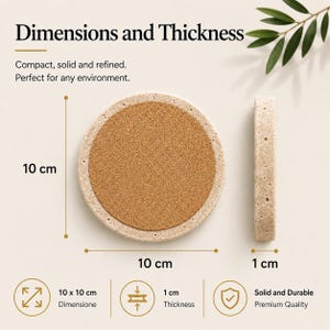 May include: A round coaster with a cork center and a light-colored stone-like border. The coaster is 10 cm in diameter and 1 cm thick. The image includes the text "Dimensions and Thickness".