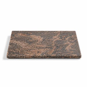 May include: A rectangular granite cutting board with a polished surface. The board features a mix of brown and black tones, creating a natural, marbled appearance. The edges are smooth and the board is set against a white background.