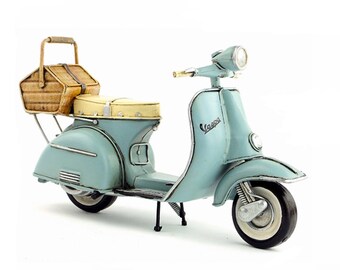 pastel pink vespa