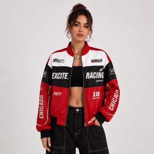 May include: A red, black, and white racing-style bomber jacket with the words "EXCITE" and "RACING" printed on the front. The jacket has the word "CHICAGO" printed vertically on the sleeves and the number "18" on the sleeves and front.