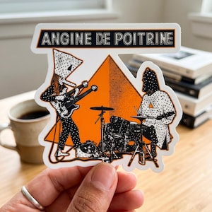 May include: A sticker featuring a band illustration with the text "ANGINE DE POITRINE". The design includes a guitarist, a drummer, and an orange triangle background. The band members are dressed in black and white polka dot outfits.
