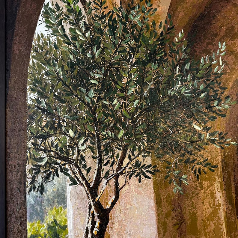 May include: An oil painting depicting a green olive tree with textured leaves and a dark trunk, framed by two large, weathered, golden-brown stone arches that create a sense of depth and perspective in the composition.