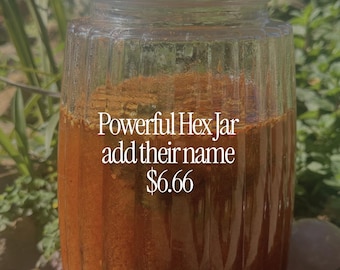 May include: A clear, vertically ribbed glass jar filled with a dark orange, textured liquid substance. The jar features a silver-coloured metal screw-top lid. Text printed on the front reads: Powerful Hex Jar add their name $6.66.
