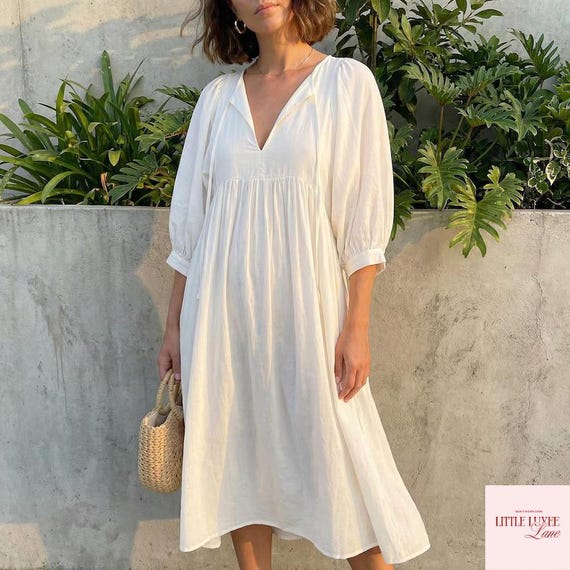 lightweight cotton summer dresses with sleeves Boho Midi Dress – Lantern Sleeve, Flowy Outfit, Bohemian Style Material:Faux Pearl An adorable option for Mardi Gras Dressy Top Cap sleeve Atria Signature Colors:Cobalt Blue