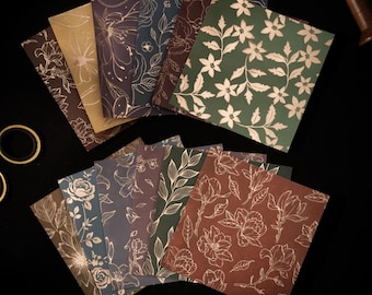 Papel vitela con estampado floral dorado, ideal para álbumes de recortes y collages, 8 hojas.
