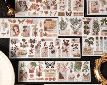 May include: A collection of decorative adhesive tape strips featuring botanical illustrations, butterflies, vintage-style labels, and wax seal motifs in shades of brown, orange, and green. The designs include various leaves, flowers, and text.