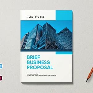 May include: A business proposal document cover featuring the text NADA STUDIO, BRIEF BUSINESS PROPOSAL, and address details. The design includes a photograph of blue-toned skyscrapers, white sections, and a bright orange pen placed to the right.