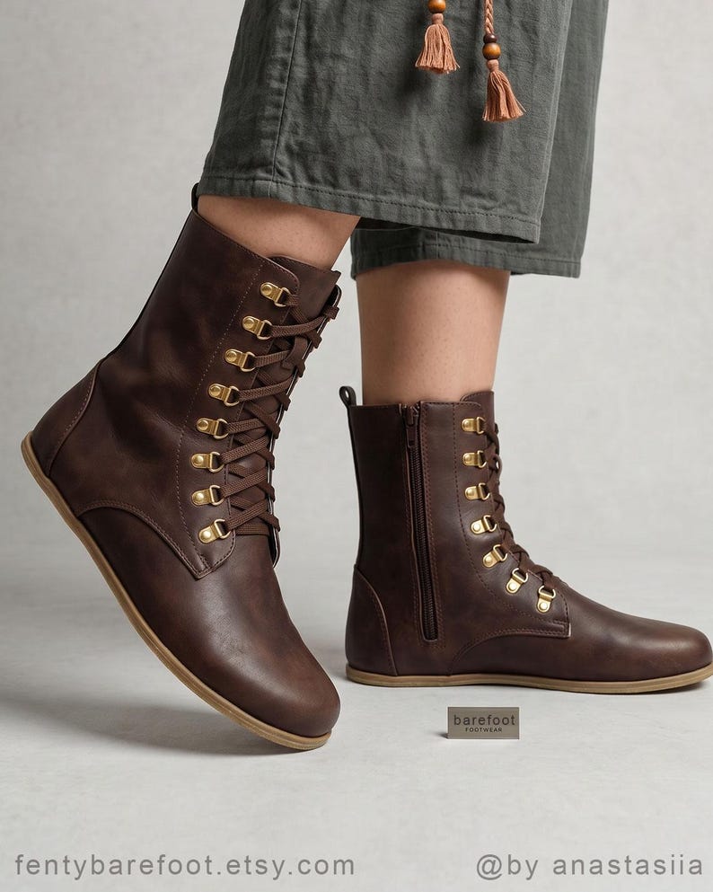 May include: Brown leather boots with a lace-up front and gold-colored eyelets. The boots have a side zipper and a flat sole. The text "fentybarefoot.etsy.com" is visible at the bottom of the image.