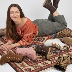 May include: A selection of ankle boots in various colors and patterns, including brown, pink, white, and leopard print. The boots are displayed on a patterned rug. The image includes the text "fentybarefoot.etsy.com" and "@by anastasiia".