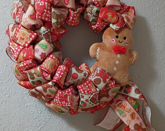 Corona navideña de hombre de jengibre hecha a mano con cola, rojo/marrón/verde