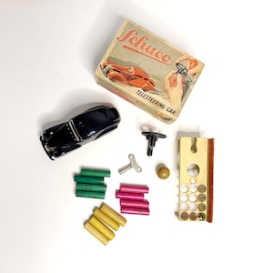 Vintage Kleinod: SCHUCO Telesteering Car 3000, komplett und unbespielt in Originalverpackung, D.R.P. Germany, schwarz