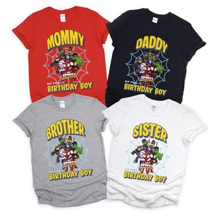 May include: Four short-sleeve t-shirts in red, black, gray, and white. Each shirt features a graphic of Marvel Spidey and His Amazing Friends characters on a spiderweb, with text reading Mommy, Daddy, Brother, or Sister of the Birthday Boy.