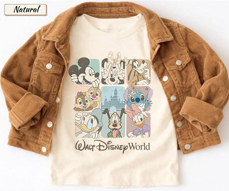 May include: A cream-colored t-shirt featuring a grid of Disney characters including Mickey, Minnie, Goofy, Chip, Dale, Stitch, Donald, Pluto, and Daisy, with a castle silhouette and the text Walt Disney World, layered under a brown corduroy jacket.