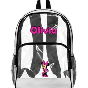 Peut inclure: Sac &agrave; dos transparent avec un motif &agrave; rayures noires et blanches. Il porte le nom "Olivia" en rose et un motif Minnie Mouse. Comprend une poign&eacute;e noire et des poches lat&eacute;rales en filet. Un sac d'&eacute;cole amusant et fonctionnel.