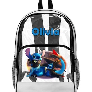 May include: A black and white striped backpack with a clear front panel. The backpack features a blue and black cartoon character design and the name "Olivia" in blue letters.