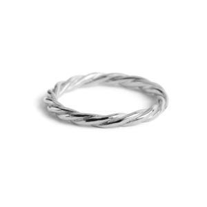May include: A polished silver ring featuring a continuous twisted rope design. The band has a uniform thickness and a reflective metallic surface, creating a circular shape with a textured, spiraling pattern throughout the entire circumference.