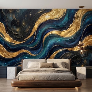 May include: A bedroom with a large, abstract mural featuring swirling gold, teal, and navy blue patterns. The bed has a wooden frame and neutral-toned bedding. Two white marble side tables flank the bed, and a modern light fixture hangs from the ceiling.